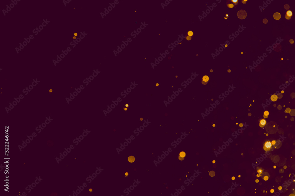 Abstract gold blur glitter bokeh on black Abstract gold blur glitter bokeh on black