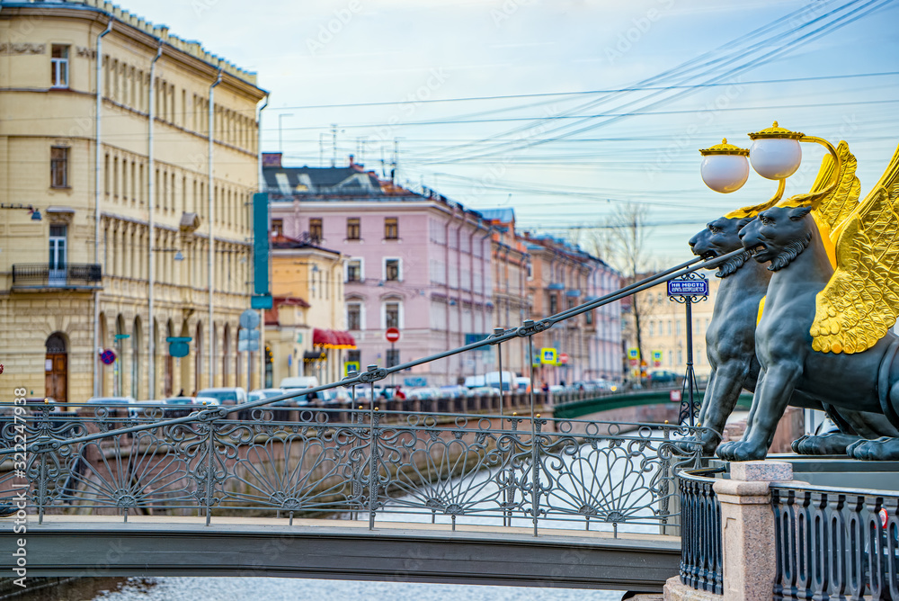 Bank Bridge is decorated with figures of griffins. Urban View of Saint Petersburg. Russia. Bank Bridge is decorated with figures of griffins. Urban View of Saint Petersburg. Russia.