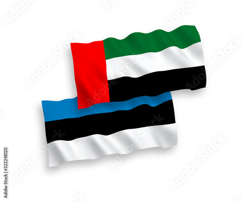National vector fabric wave flags of Estonia and United Arab Emirates isolated on white background. 1 to 2 proportion.