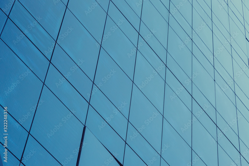 Blue glass windows of modern office building Blue glass windows of modern office building