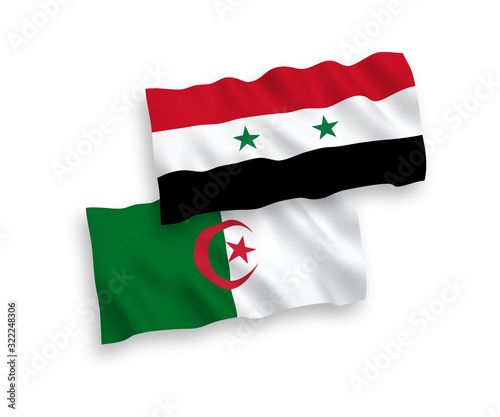 National vector fabric wave flags of Algeria and Syria isolated on white background. 1 to 2 proportion.
