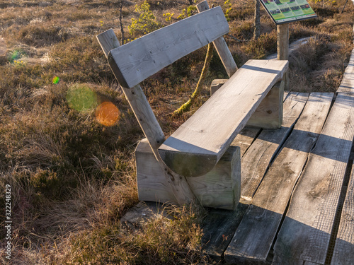 winter landscape with wooden pedestrian platform photo