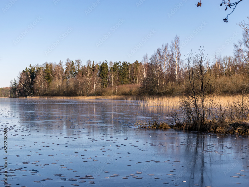 Fototapeta premium winter landscape with frozen lake