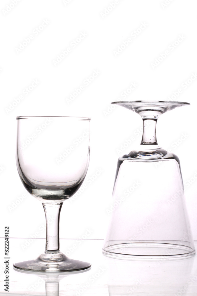 Empty wine glass, isolated on a white background Empty wine glass, isolated on a white background