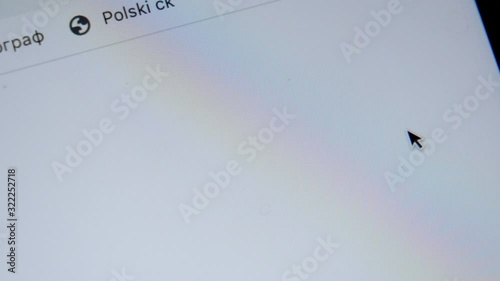 Online shopping. Close up of mouse clicking on Shopping Cart Icon on Screen