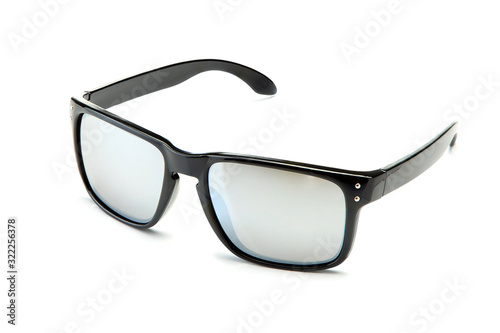 Classic black sunglasses with smoky mirror lenses isolated on white background