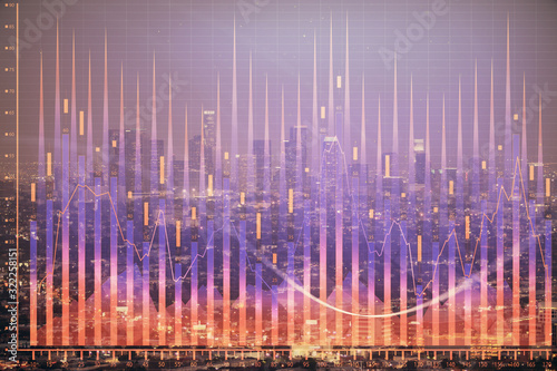 Financial graph on night city scape with tall buildings background double exposure. Analysis concept. © peshkova