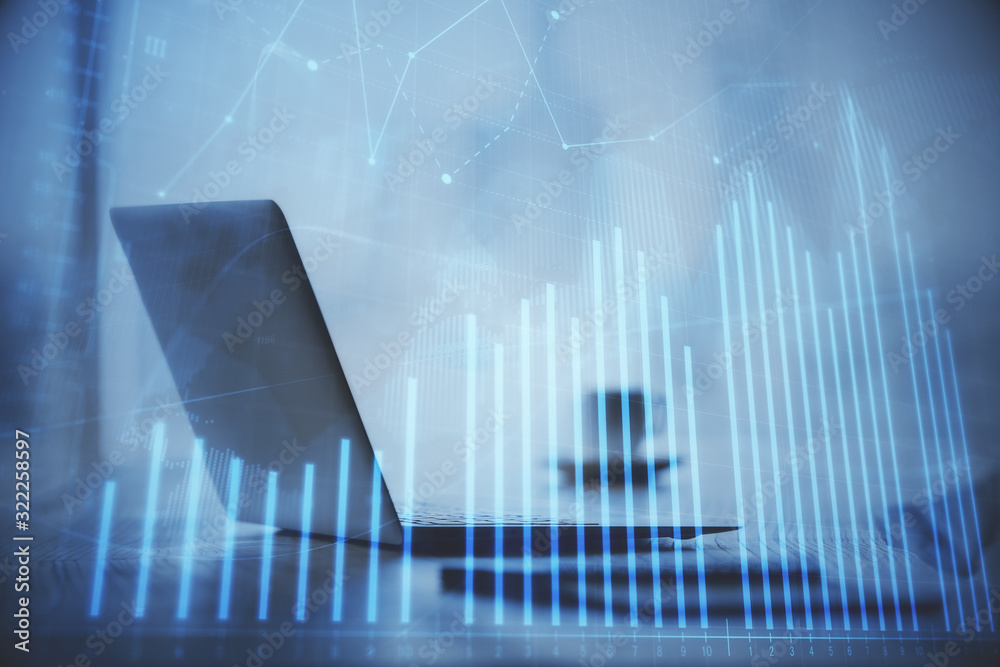 Double exposure of graph and financial info and work space with computer background. Concept of international online trading. Double exposure of graph and financial info and work space with computer background. Concept of international online trading.