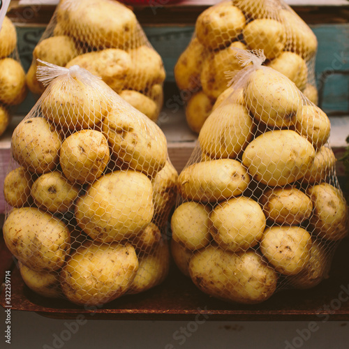 String bags with packaged fresh pure potatoes