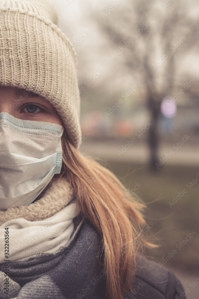 Plakat Coronavirus MERS-CoV Chinese infection Virus masked girl on the background of the city in smog, the concept of the epidemic of the virus in China coronavirus nCov