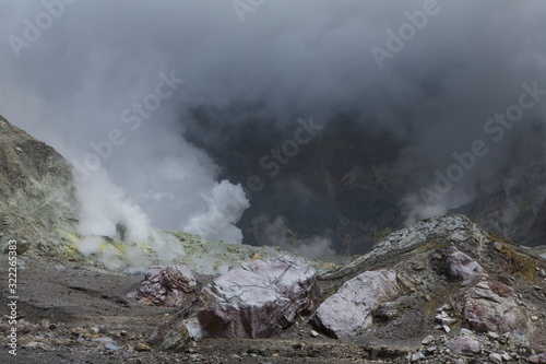 Whakaari / White Island New Zealand active volcano. Moonscape.  Andesite stratovolcano Sulphur mining photo