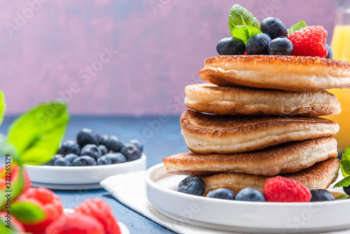 Pile of Pancakes Crepes Served with Fresh Fruits. Shrove Tuesday