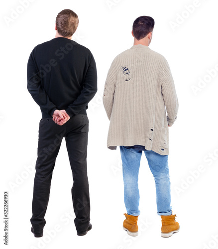 Back view of two man in sweater.