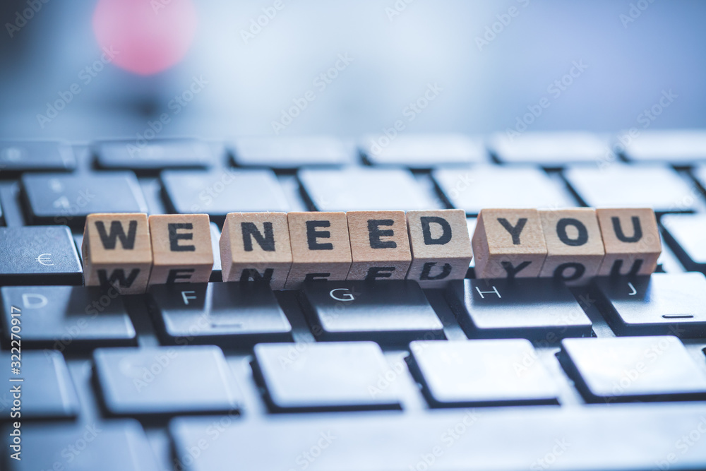 Hiring and recruiting concept: “We need you” letters on black keyboard. Hiring and recruiting concept: “We need you” letters on black keyboard.