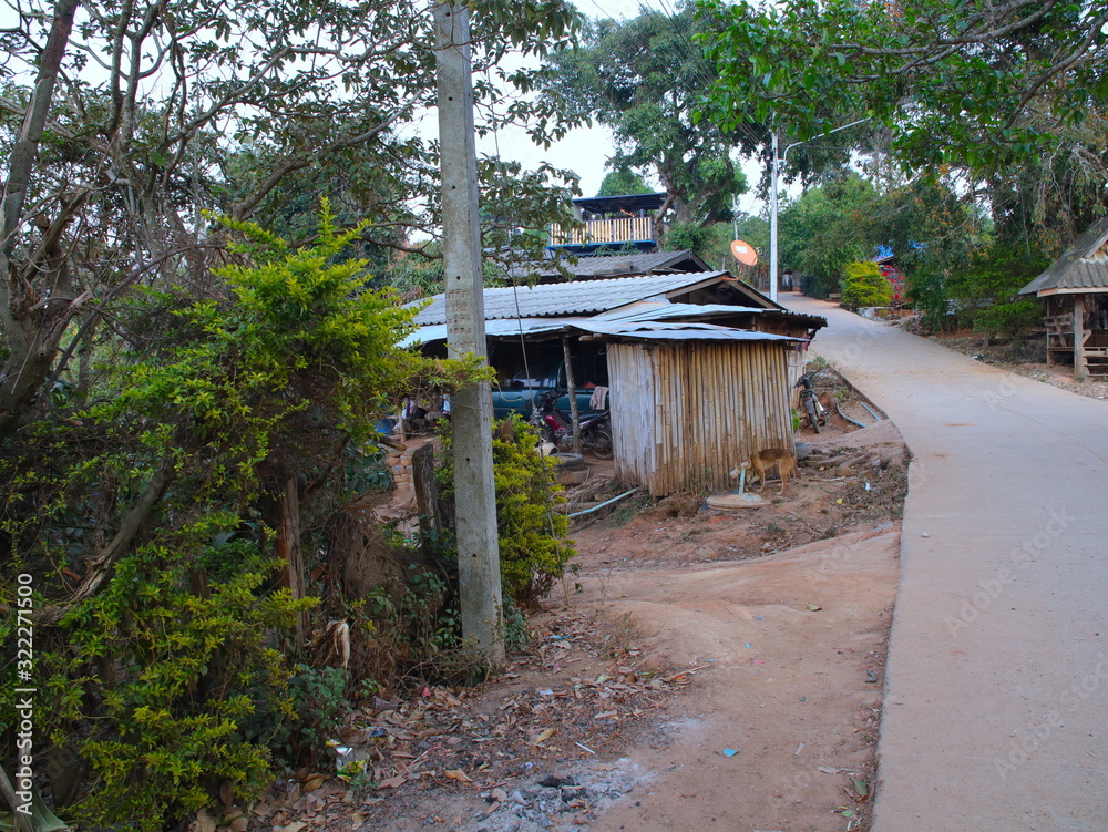 wooden and Tin house in a Hmong Village deep in the mountains of Chiangmai Thailand
