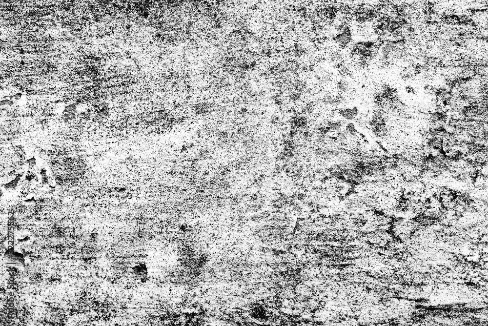 Fototapeta premium Texture of a concrete wall with cracks and scratches which can be used as a background