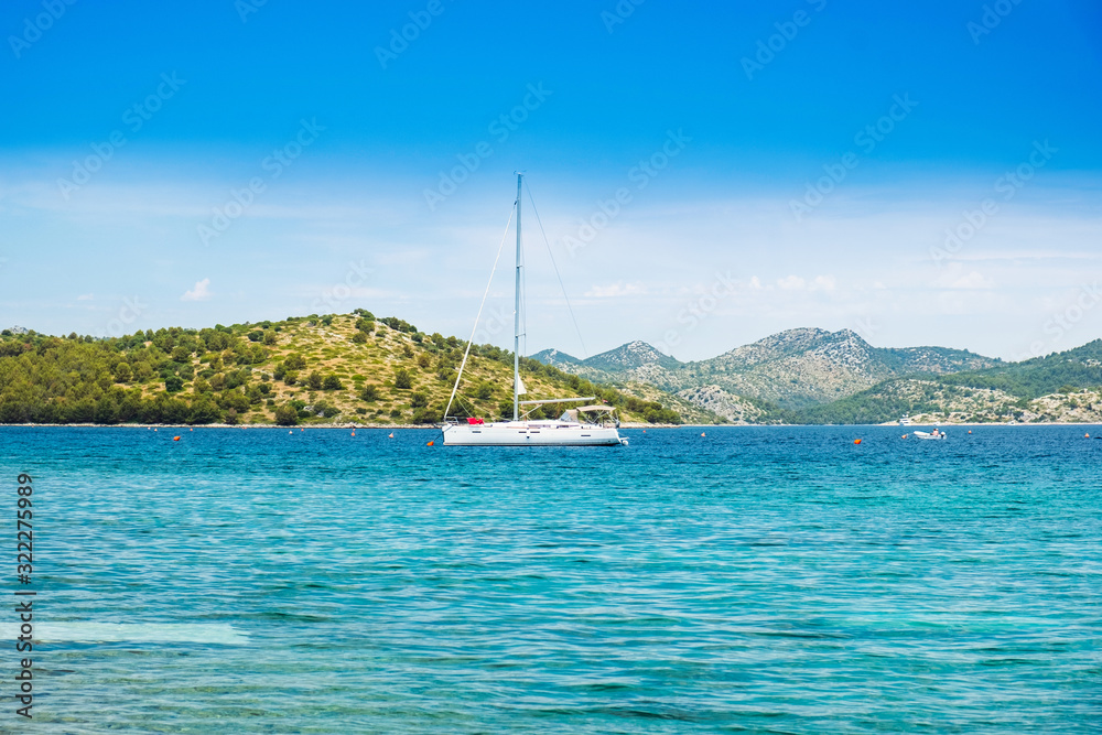 Croatia, Adriatic coast, beautiful seascape on Dugi Otok island, yachts anchored in blue bays in Telascica national park
