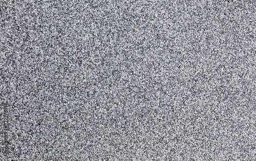 Natural stone carpet. Decorative stone coating. Slip resistant floor finish containing natural stone particles
