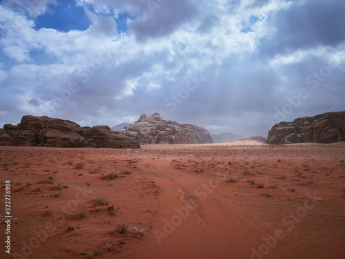 Beautiful Scenery Scenic Panoramic View Red Sand Desert and Ancient Sandstone Mountains Landscape in Wadi Rum, Jordan