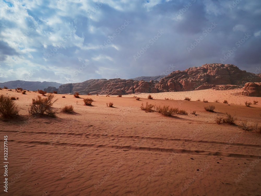 Beautiful Scenery Scenic Panoramic View Red Sand Desert and Ancient Sandstone Mountains Landscape in Wadi Rum, Jordan Beautiful Scenery Scenic Panoramic View Red Sand Desert and Ancient Sandstone Mountains Landscape in Wadi Rum, Jordan