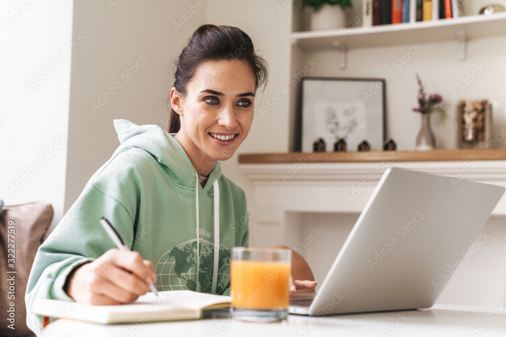 Optimistic cheerful beautiful brunette woman