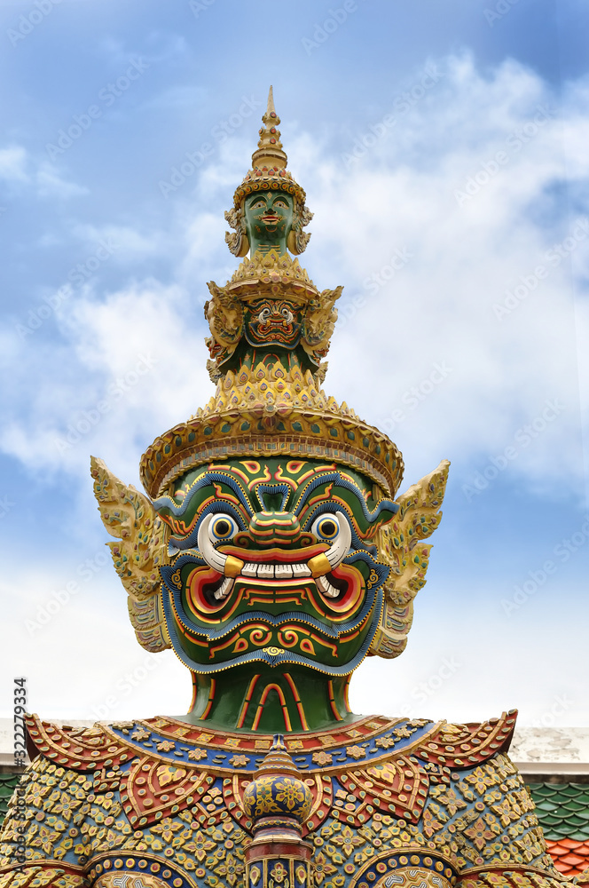 Fototapeta premium Giant or Yaks-ha at Wat Ph-ra Kaew in Bangkok, Thailand.Wat Phra Kaew or The Emerald Buddha temple have many of the statues and figurines there are characters from the Ramakien