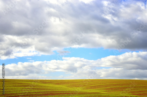 Photo of cloudscape and meadow view