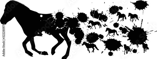 running horse from black blots isolated on white