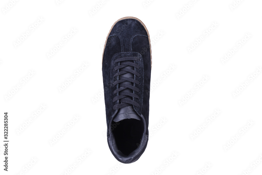 One black sneaker on a white background top view. One black sneaker on a white background top view.