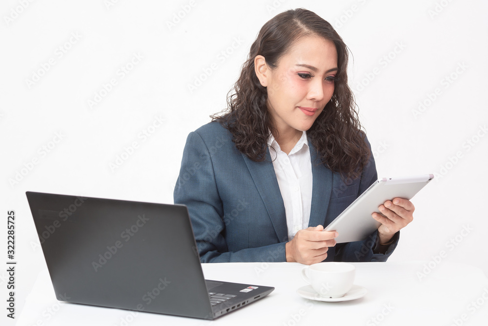 Beautiful young executive with her work and coffee Beautiful young executive with her work and coffee
