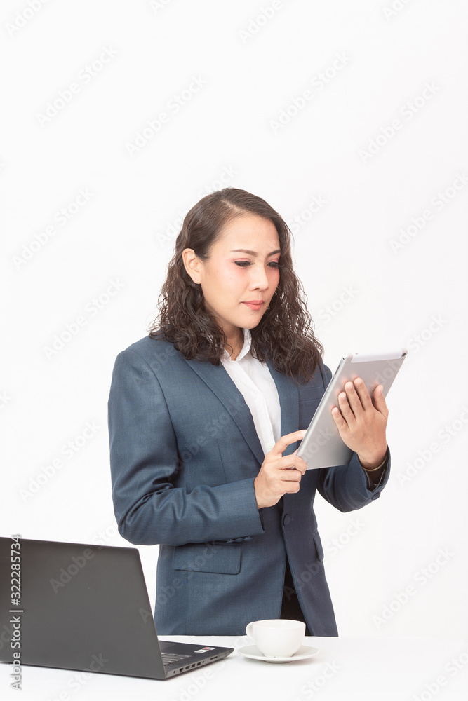 Beautiful young executive with her work and coffee Beautiful young executive with her work and coffee