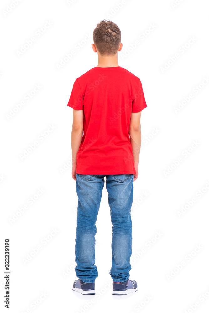 Full length portrait of young caucasian teen boy - rear view, isolated on white background. Funny teenager - back view. Handsome child wearing red t-shirt. Full length portrait of young caucasian teen boy - rear view, isolated on white background. Funny teenager - back view. Handsome child wearing red t-shirt.