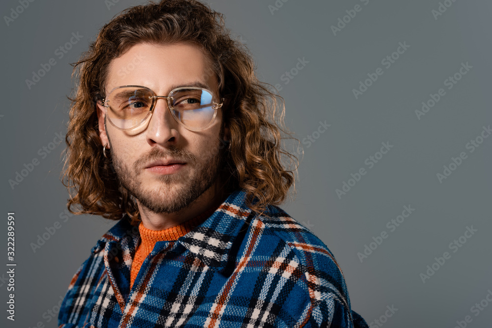 Fototapeta premium handsome man in shirt looking away isolated on grey