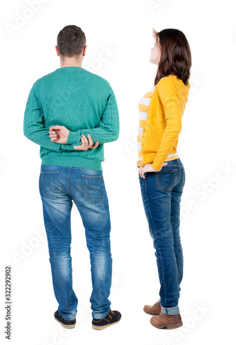 Back view of couple in sweater.