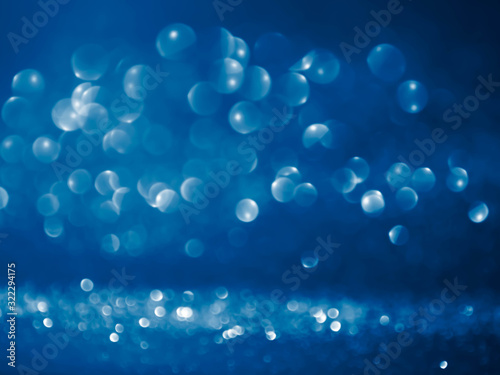 blue glitter christmas abstract background. Defocused background.