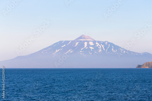 View on a Kunashir island with volcano Tyatya from the sea