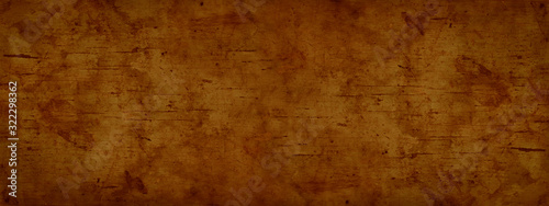  Red grunge background. Orange rough dirty surface texture. Abstract wide grunge banner with copy space for your design.