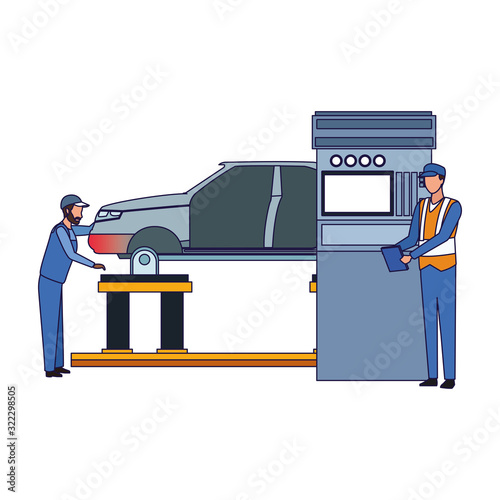 car mechanics supervising a lifted car and scanner machine