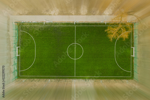 Empty Artificial Football Field on the street top view shooting drone. A football ground with artificial turf.
