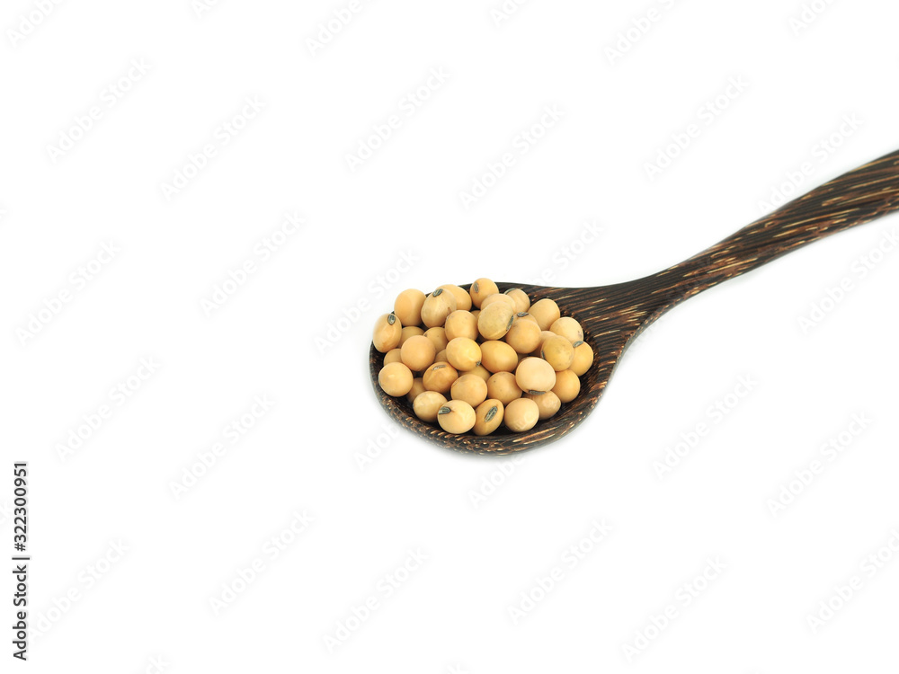 Soybeans in wooden spoon isolated on white background. Soybeans in wooden spoon isolated on white background.