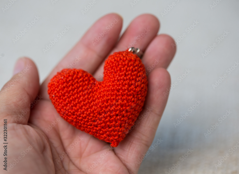 Fototapeta premium knitted red heart