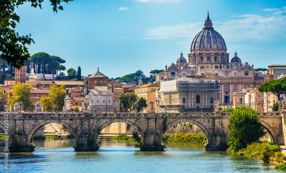 View across the Tiber to St. Peter's Basilica from the Angel Bridge in Rome Lazio Italy