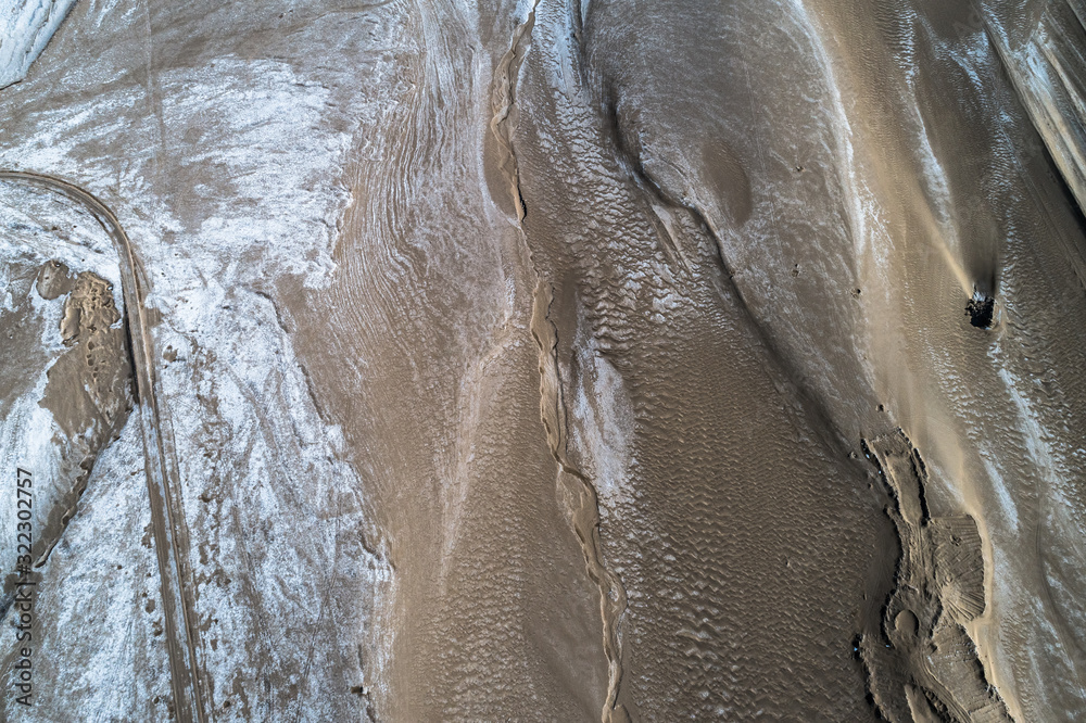 aerial view of a dry lakebed coated with salts in northwest of China aerial view of a dry lakebed coated with salts in northwest of China