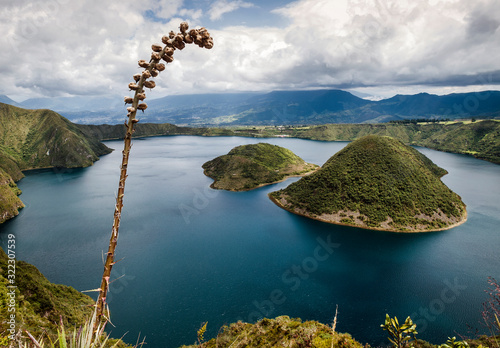 Yerovi and Teodoro Wolf little islands inside Cuicocha Lake in the western Andes mountain range, Imbabura province, Ecuador photo