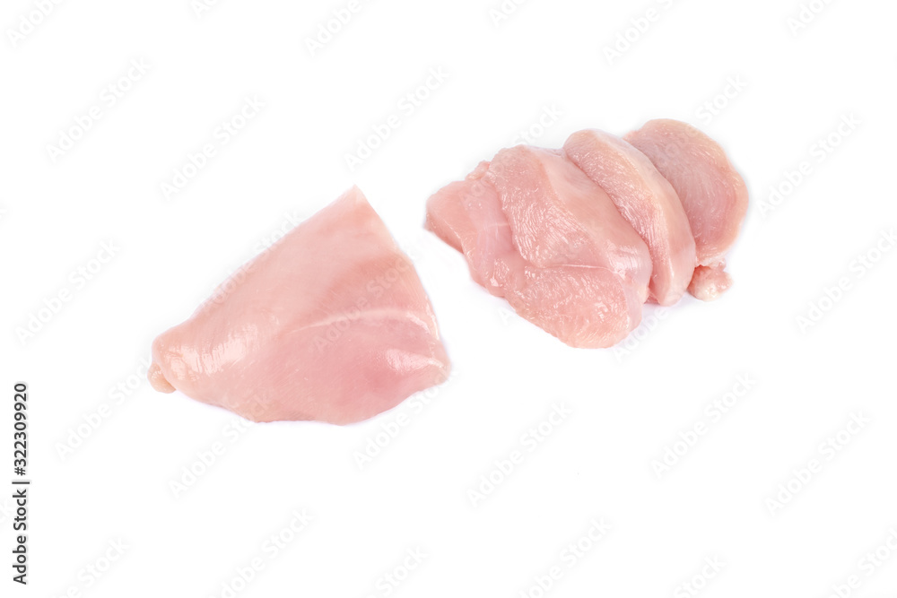 uncooked chicken fillet and slices of chicken fillet isolated on white. uncooked chicken fillet and slices of chicken fillet isolated on white.