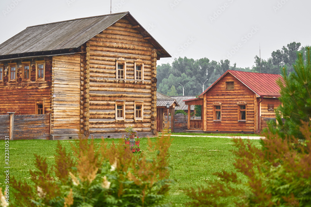 Wooden houses in a russian modern village Shushenskoe Wooden houses in a russian modern village Shushenskoe