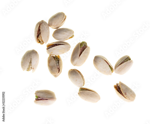 Ripe pistachios nuts isolated on a white background
