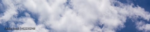 banner of beautiful blue sky background with a white clouds