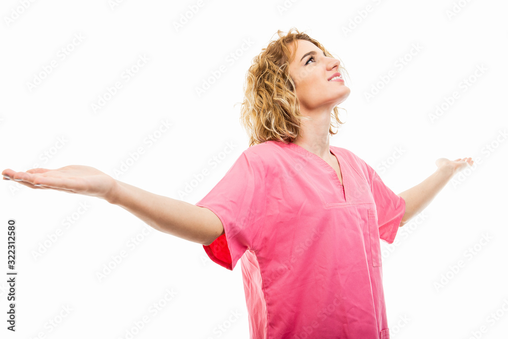 Portrait of nurse wearing pink with arms spread like winning Portrait of nurse wearing pink with arms spread like winning