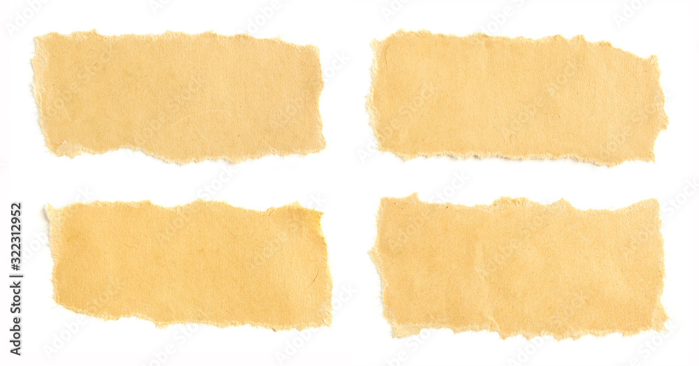 Set of small torn pieces of brown tan cardboard paper with rough surface isolated on white background. Copy space for text message.